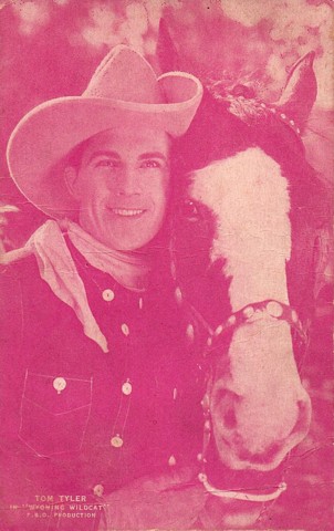 Tom Tyler with horse in The Wyoming Wildcat pink postcard